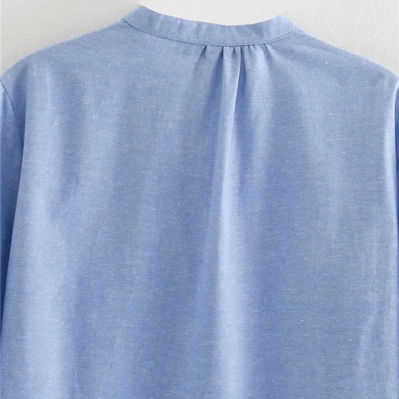 BLOUSE WITH RUFFLE TRIMS